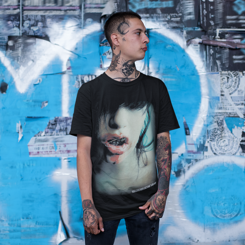 Tattooed man wears guy wearing YOU LOVE HER COZ SHE&