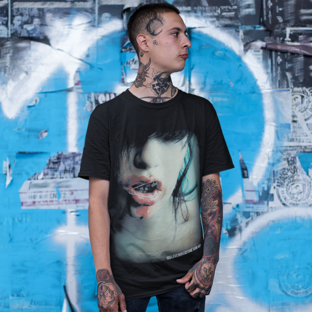 Tattooed man wears guy wearing YOU LOVE HER COZ SHE&